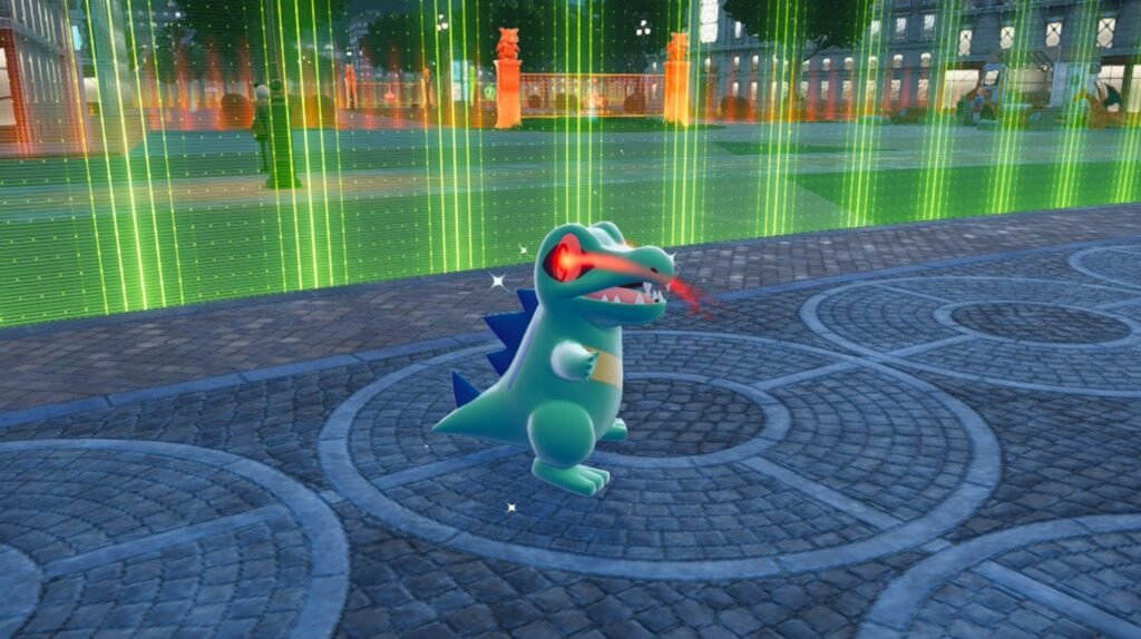 In-game screenshot showing Alpha Totodile in battle with visible size difference